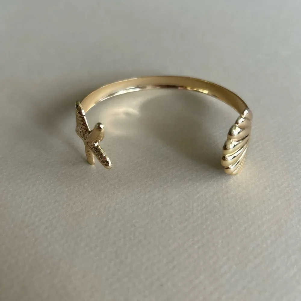 Anthropologie elegant gold